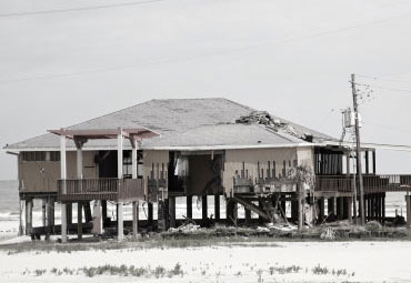 wind damage - spray foam can help prevent uplift to Midland roofs